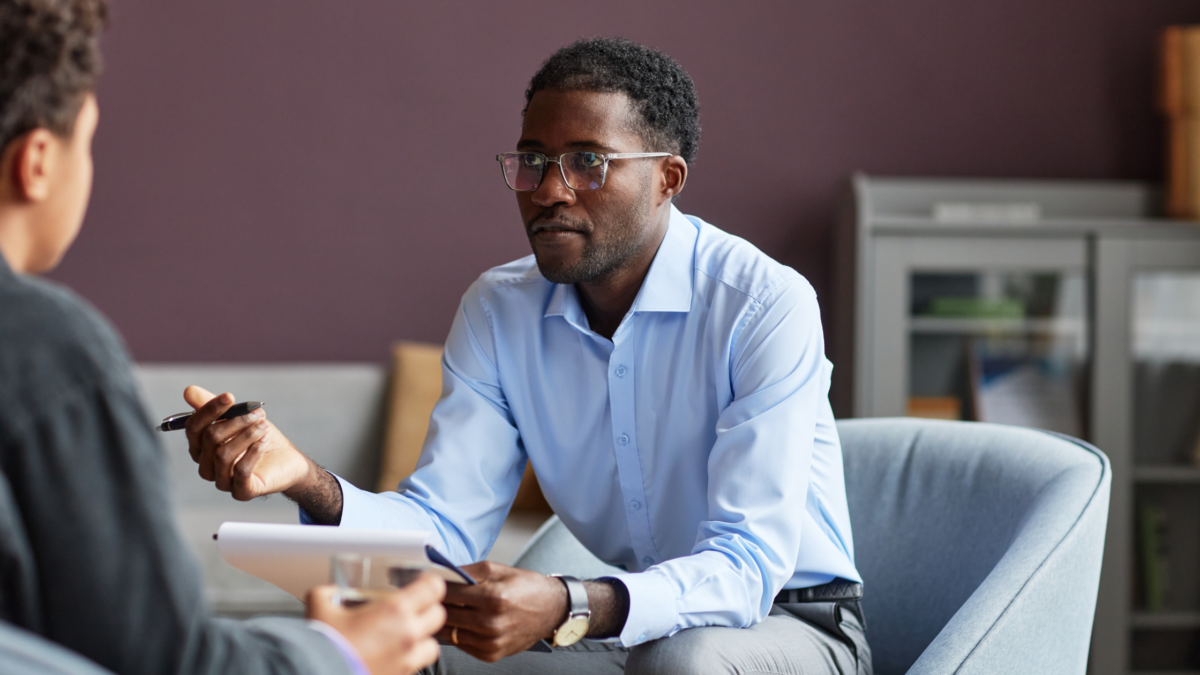 founder on a B2B sales call taking notes on prospect problems